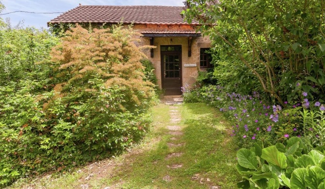 A romantic hamlet with lush gardens on a hill